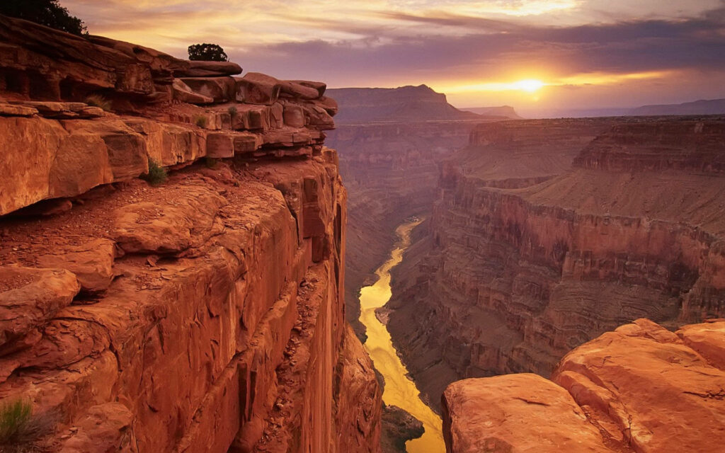 Sunset over Arizona cliffs and winding river showcasing dramatic desert landscape beauty wallpaper