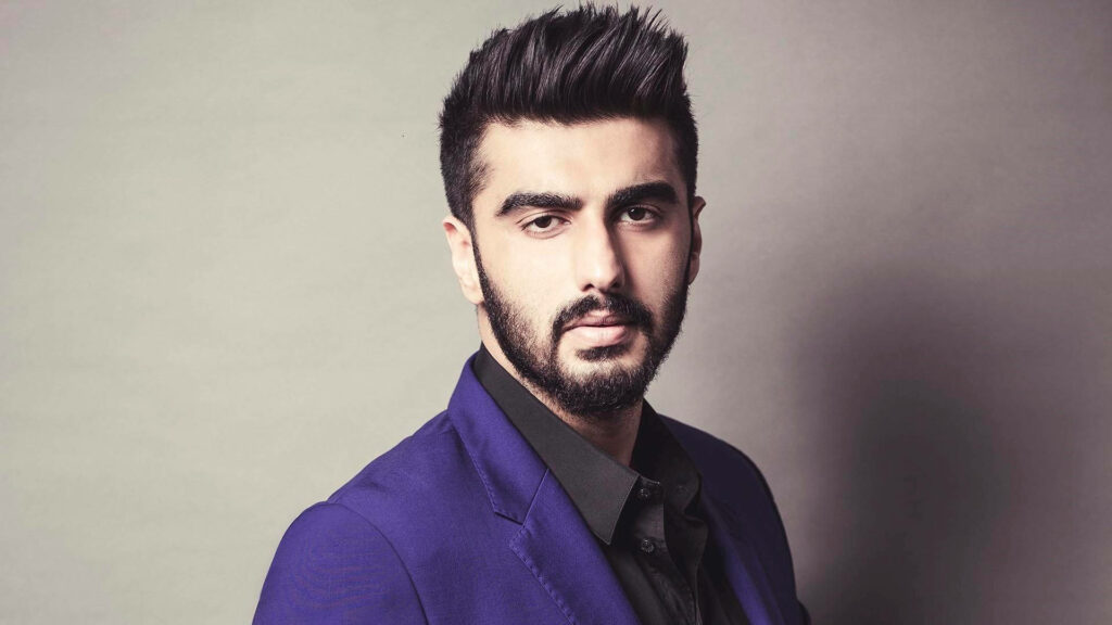 Arjun Kapoor serious expression sharp blue suit neutral soft background stylish wallpaper