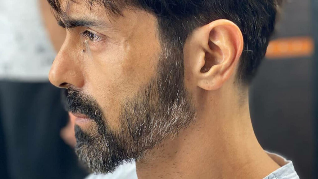 Arjun Rampal sharp side profile with defined features and salt and pepper beard stylish wallpaper