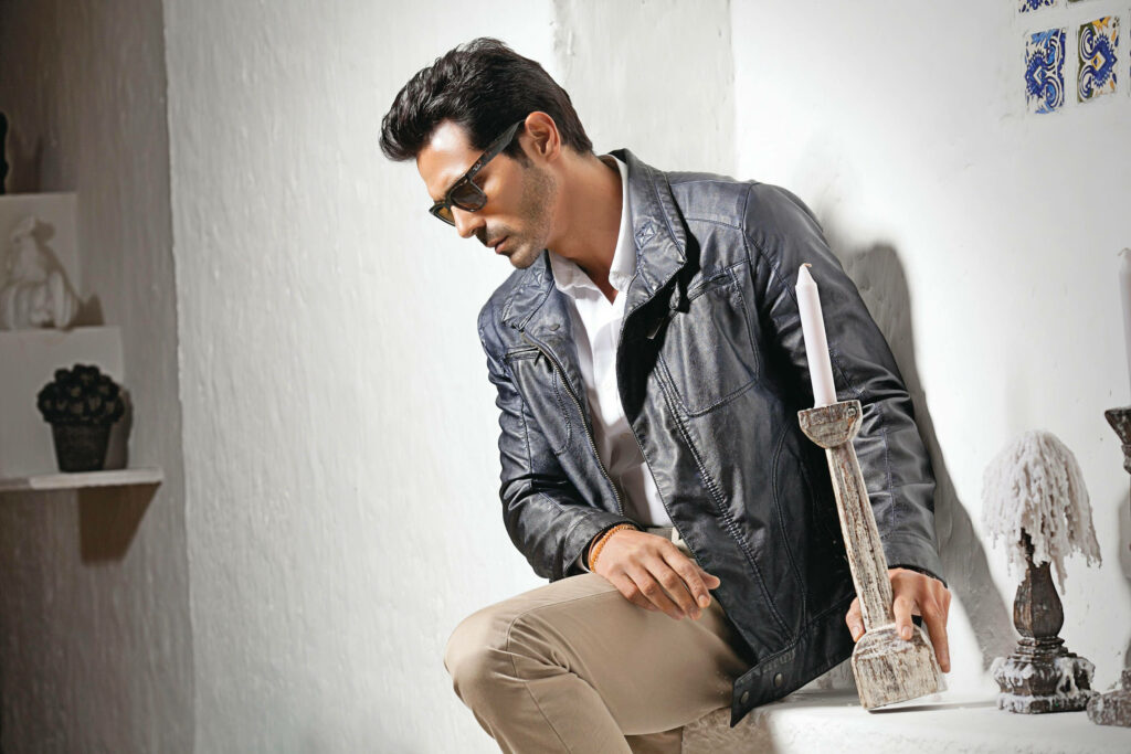 Arjun Rampal stylish black leather jacket sunglasses modern white backdrop wallpaper image