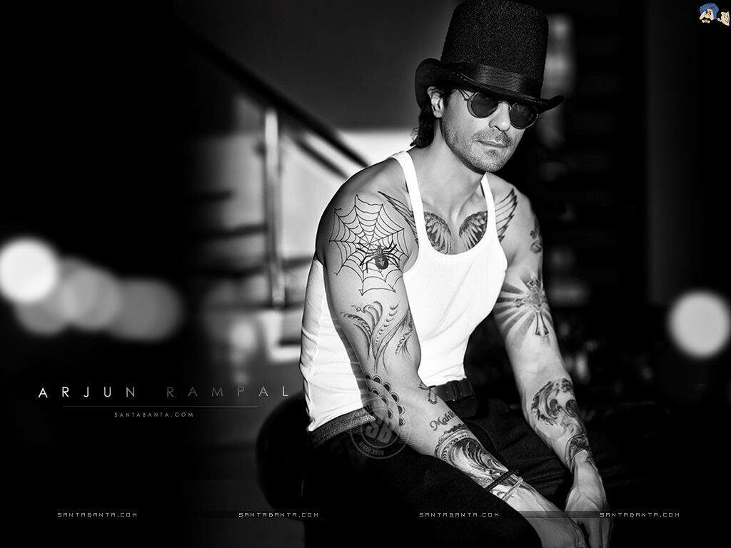 Arjun Rampal stylish black suit confident modern look striking wallpaper background image