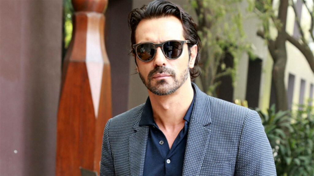 Arjun Rampal in checkered suit and sunglasses stylish confident modern sophisticated wallpaper