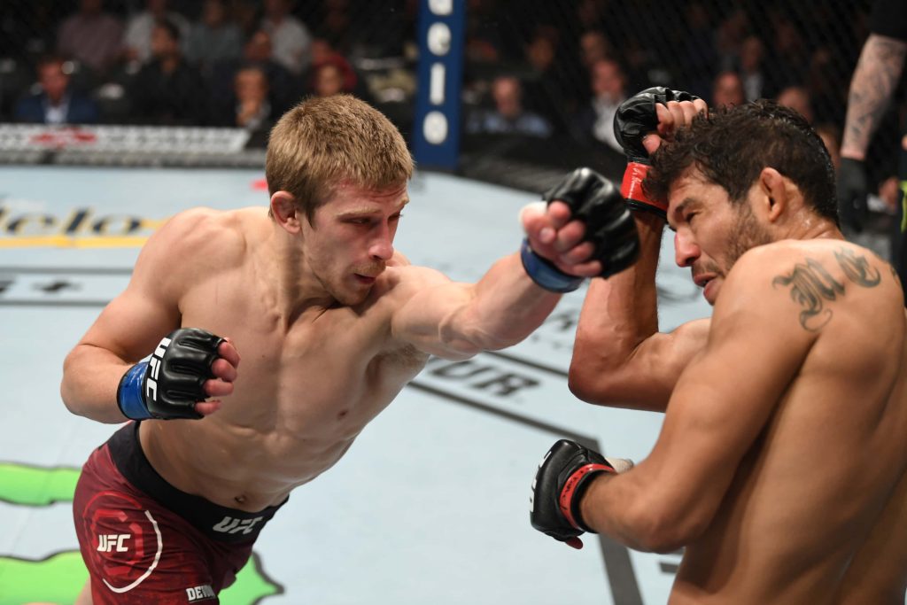 Arnold Allen punches Gilbert Melendez UFC 239 intense MMA fight Octagon action wallpaper