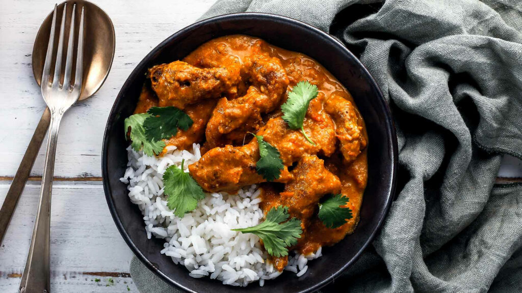 Delicious Butter Chicken Curry Wallpaper: Comforting Indian Dish