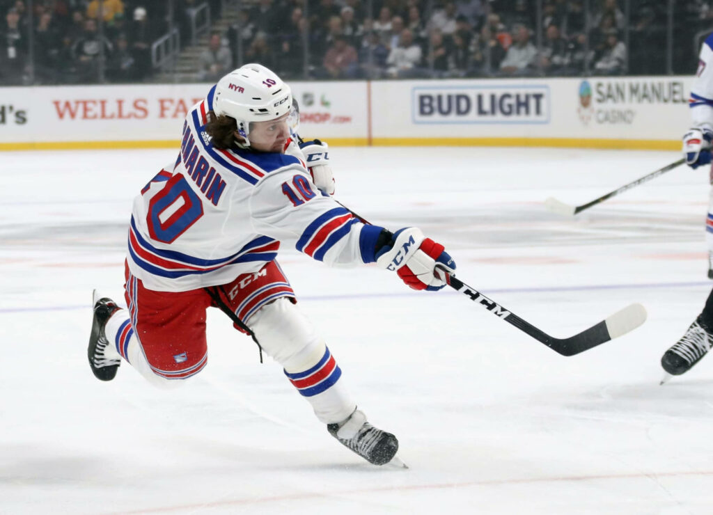 Artemi Panarin in Action: Intense Hockey Game Wallpaper Background