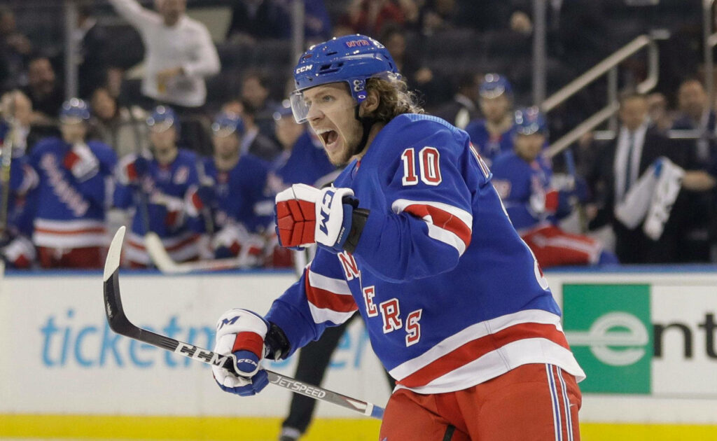 Artemi Panarin intense shout in New York Rangers uniform during exciting hockey game wallpaper