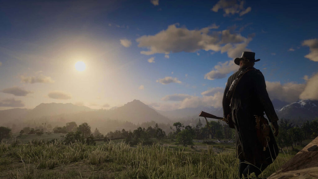 Arthur Morgan cowboy silhouette at sunset overlooking wild frontier grassy landscape wallpaper