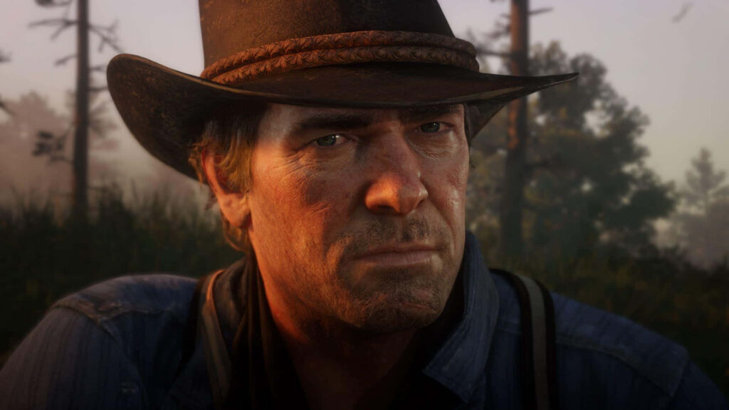 Arthur Morgan from Red Dead Redemption 2 gazes intensely in sunset forest wallpaper background