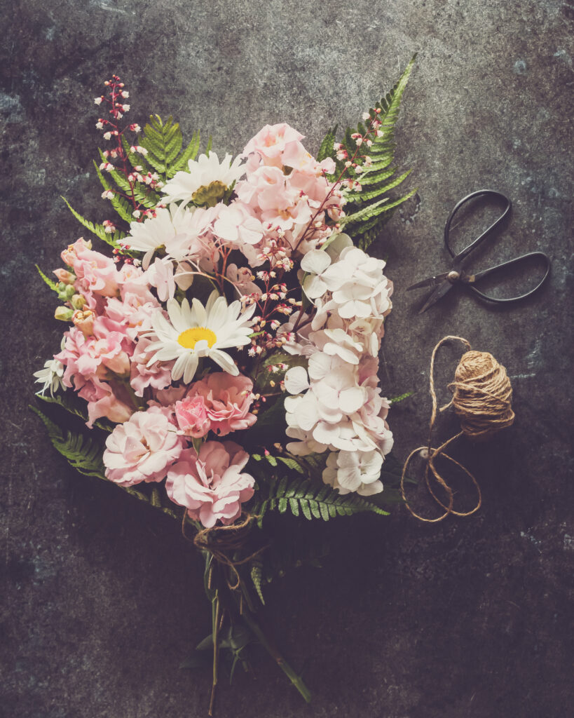 Artisan Floral Wallpaper: Pink Blooms & Daisy on Dark Background