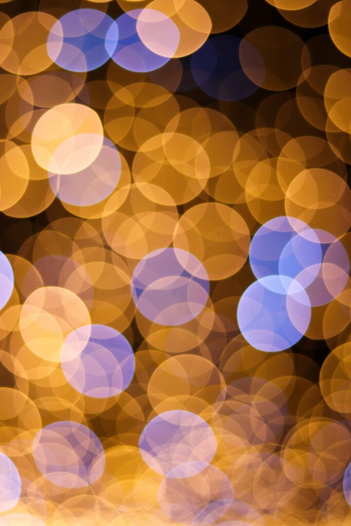Dreamy 4000x6000 Bokeh Wallpaper in Warm Gold and Purple Tones
