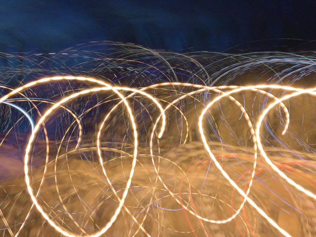 Dynamic Light Trails Wallpaper: Artistic Long Exposure Background