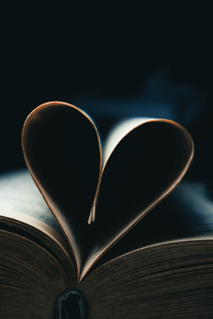 Heart-Shaped Pages: Elegant Artistic Wallpaper of True Love