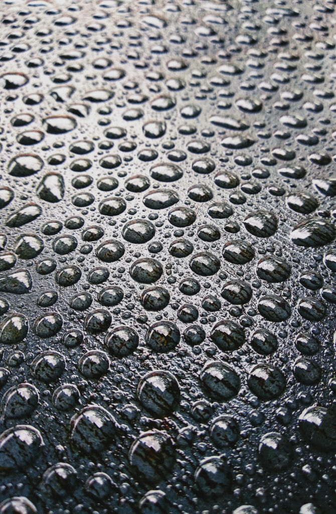 Dripping Elegance: Captivating Water Droplets for iPhone Lock Screen Aesthetic Wallpaper