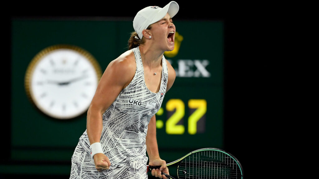 Ashleigh Barty shouting in celebration on tennis court showing determination and competitive spirit Wallpaper
