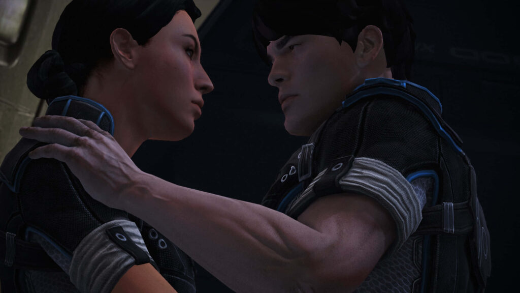 Ashley Williams from Mass Effect sharing an emotional intimate moment with another character wallpaper