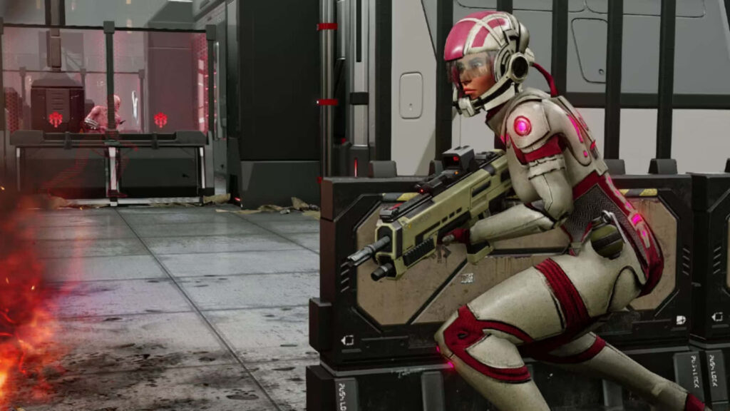 Ashley Williams in full combat armor aiming weapon ready for action futuristic Mass Effect wallpaper