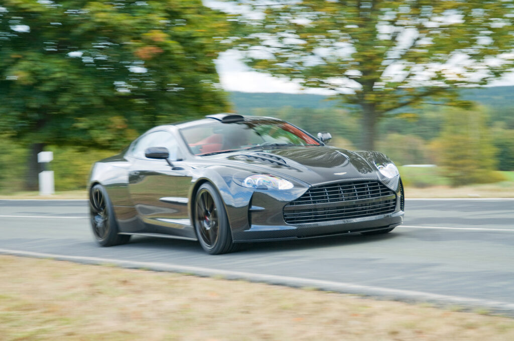 Dynamic Aston Martin DB9 Wallpaper: Speed, Elegance & Freedom