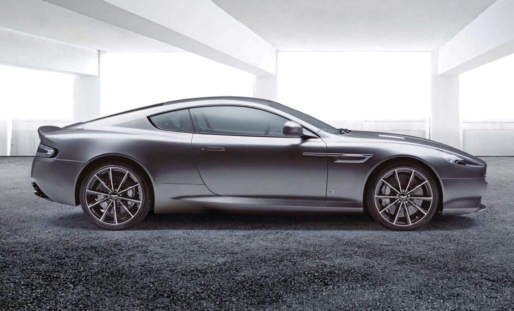 Aston Martin DB9 luxury car wallpaper showcasing sleek profile and high performance design