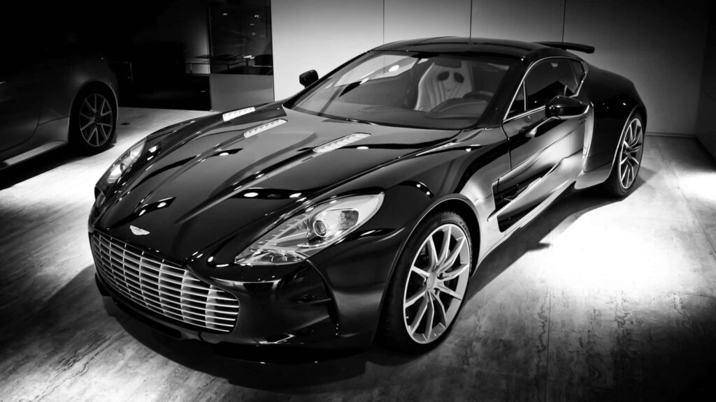 Aston Martin One77 sleek monochrome wallpaper showcasing advanced engineering and elegant design