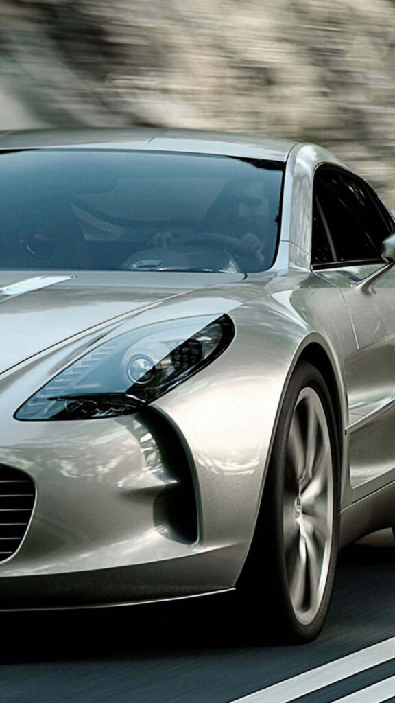 Aston Martin One-77 wallpaper highlighting sleek aerodynamic curves and luxury design in motion