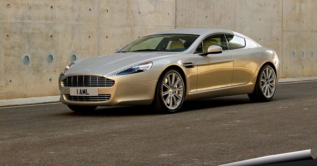 Aston Martin Rapide S speeding on urban street sleek design dynamic luxury sports car wallpaper