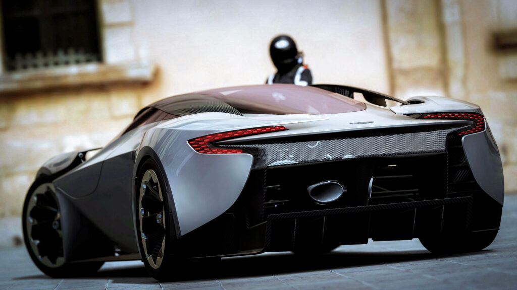 Dynamic Aston Martin Sports Car: Luxury & Aerodynamics Wallpaper