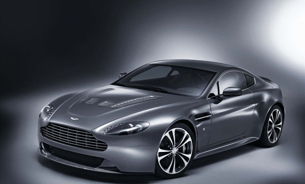 Aston Martin V12 Vantage sleek luxury sports car high-performance engineering wallpaper background