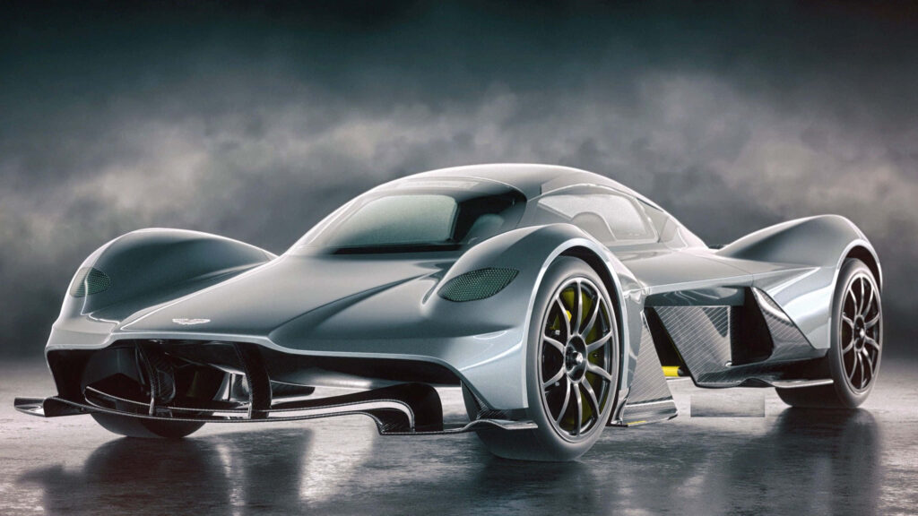 Aston Martin Valkyrie hypercar with futuristic aerodynamic design high performance wallpaper background