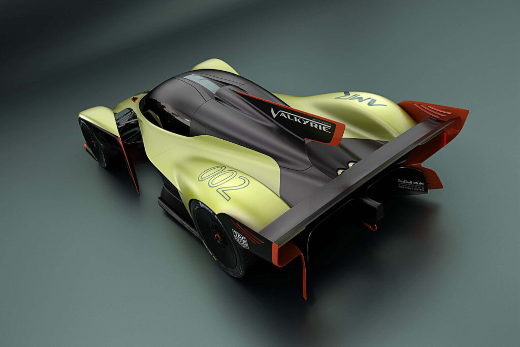 Aston Martin Valkyrie supercar showcasing aerodynamic curves and race-ready design wallpaper background