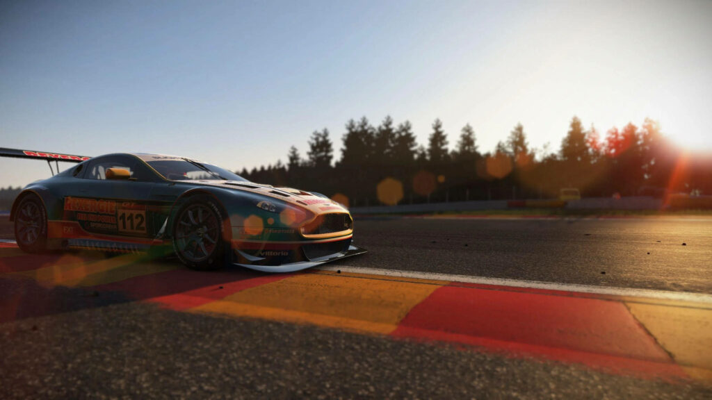 Aston Martin Vantage GT racing on sunlit track realistic game screenshot wallpaper background