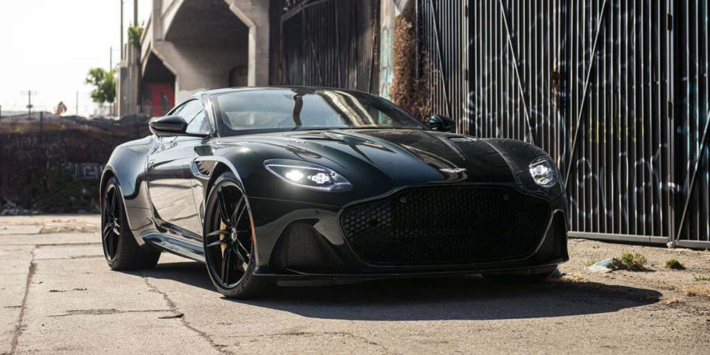 Sleek Aston Martin Wallpaper: Elegance Meets Luxury & Performance