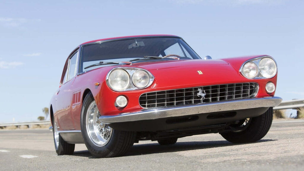 Classic Appeal: Captivating Vintage Ferrari 330 GTC in an Eye-Catching Wallpaper