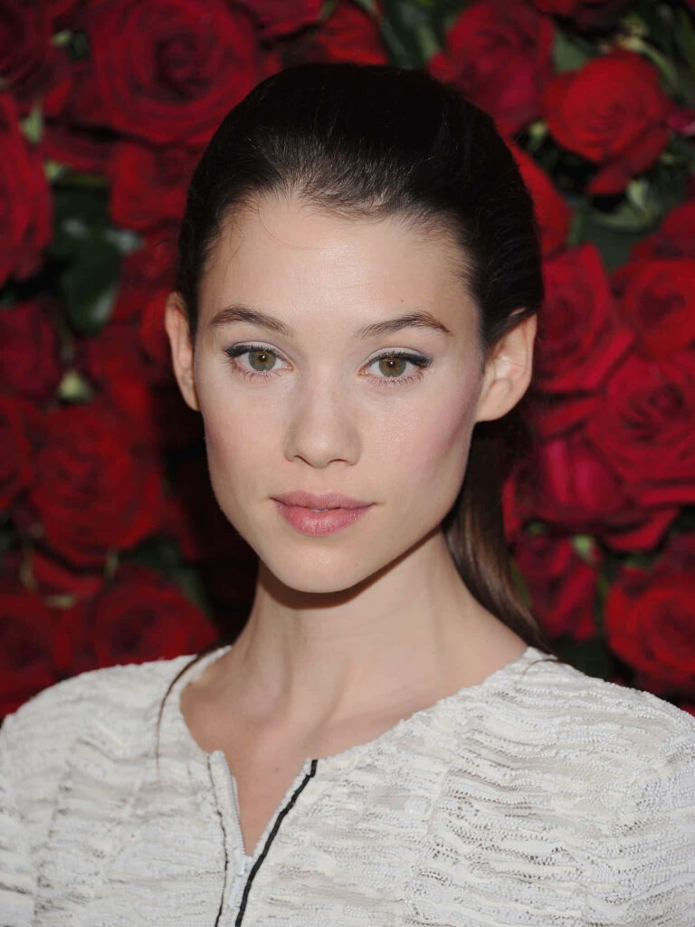 Àstrid Bergès-Frisbey portrait with red rose background graceful and radiant wallpaper image