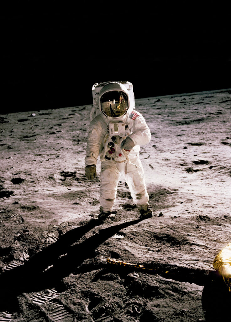 Astronaut on Moon Wallpaper | Iconic Lunar Mission Background