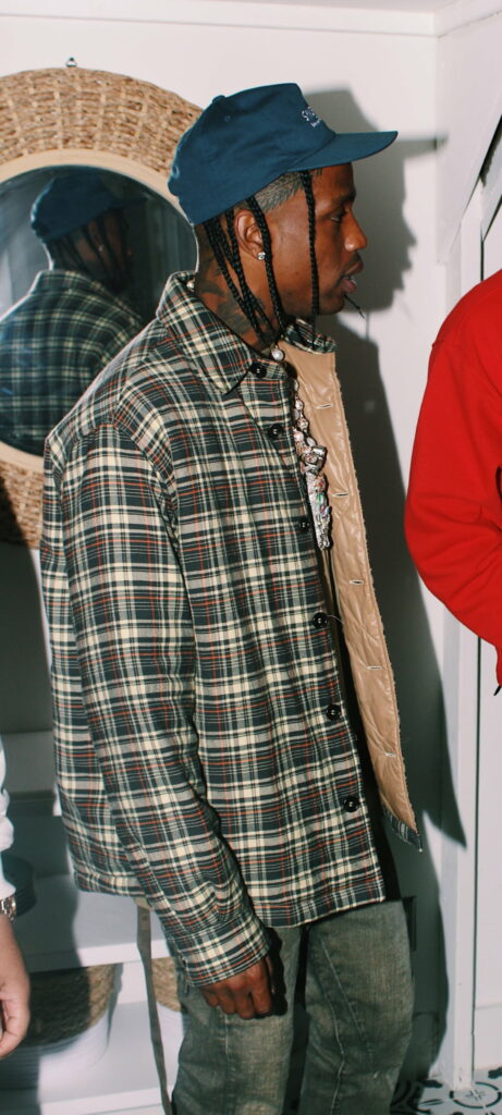 Utopian Dreams: A Captivating HD Wallpaper of Rapper Travis Scott in Astroworld