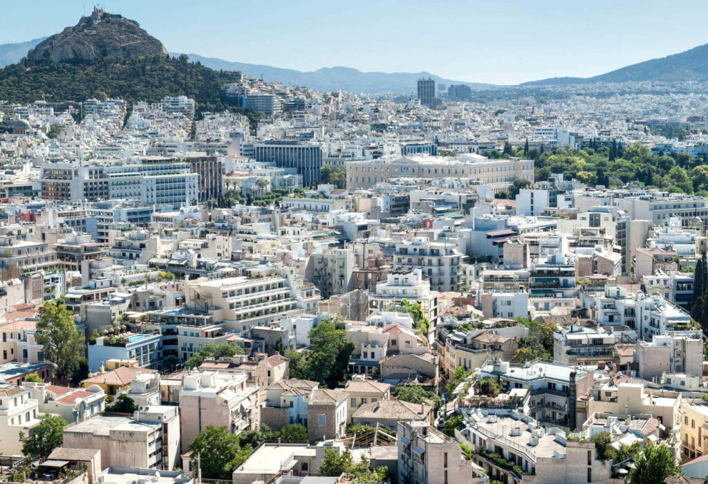 Athens cityscape with Mount Lycabettus showcasing ancient history and modern skyline wallpaper