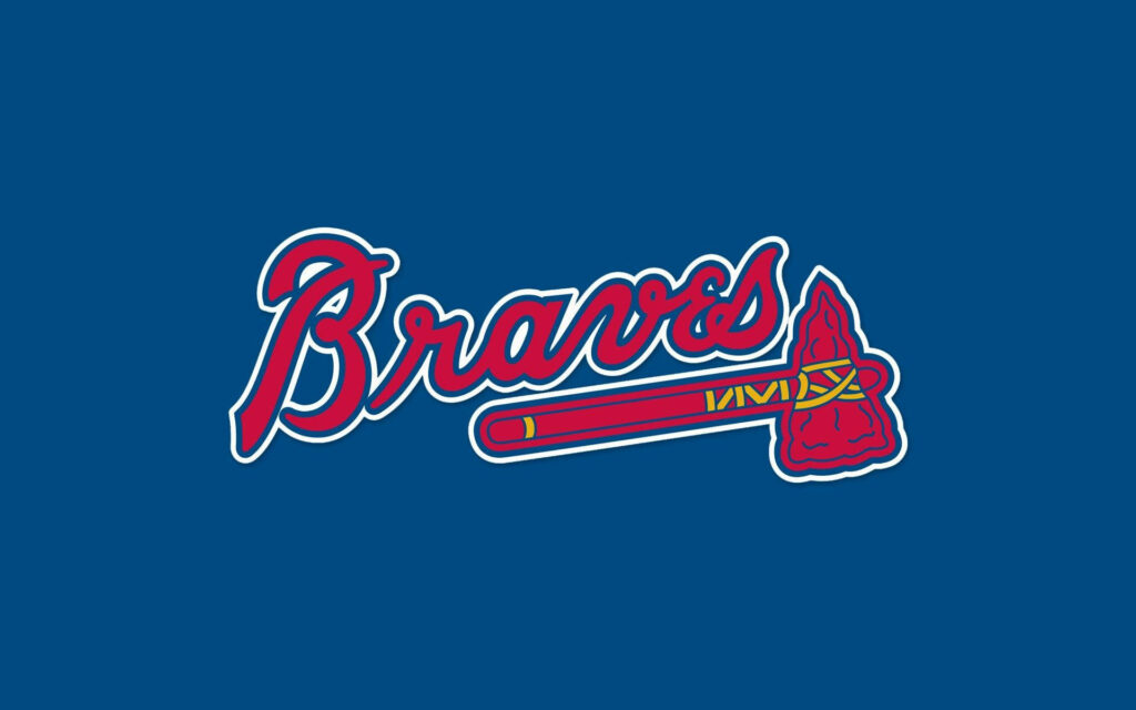 Atlanta Braves wallpaper with iconic Braves script logo and tomahawk on solid blue background