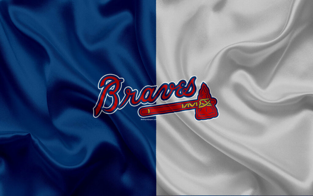 Atlanta Braves logo on textured blue and white cloth flag wallpaper background for fans