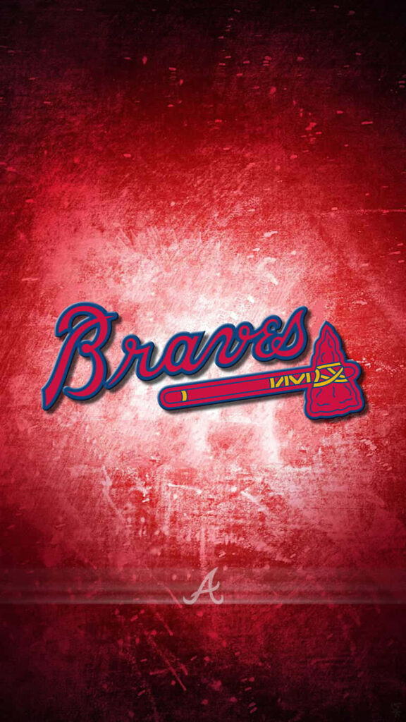 Atlanta Braves wallpaper with classic logo and tomahawk on vibrant red textured background