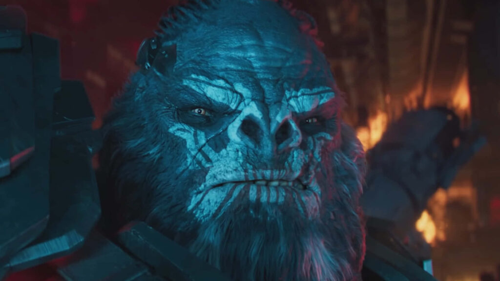 Atriox leader of Banished army stands ready for battle with fiery Halo background wallpaper