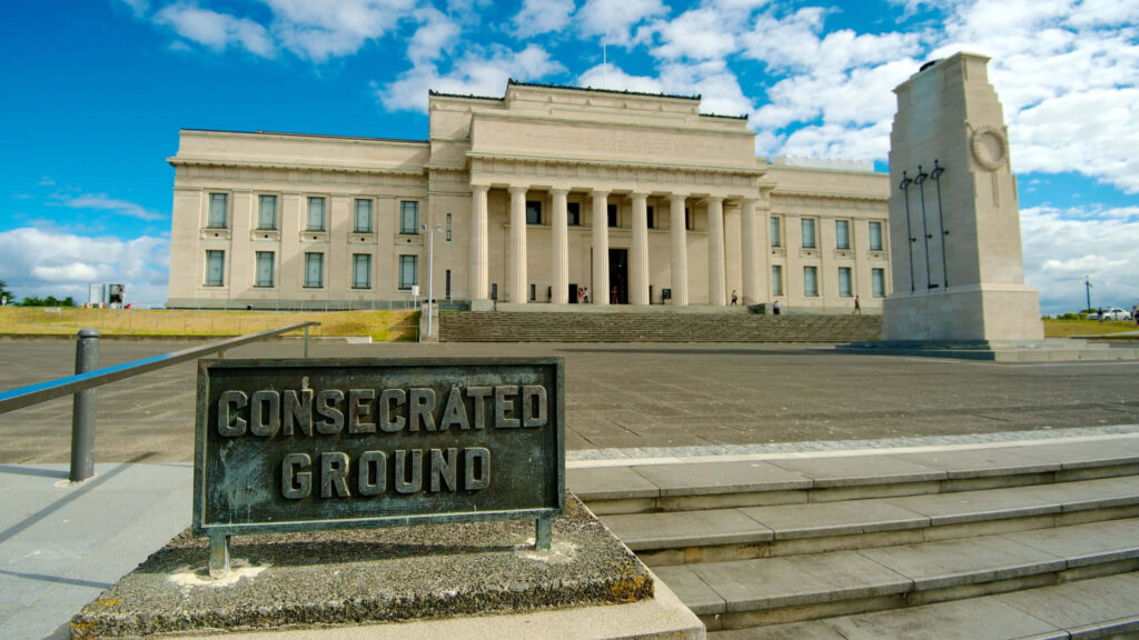 Auckland War Memorial Museum neoclassical architecture with consecrated ground plaque blue sky Wallpaper