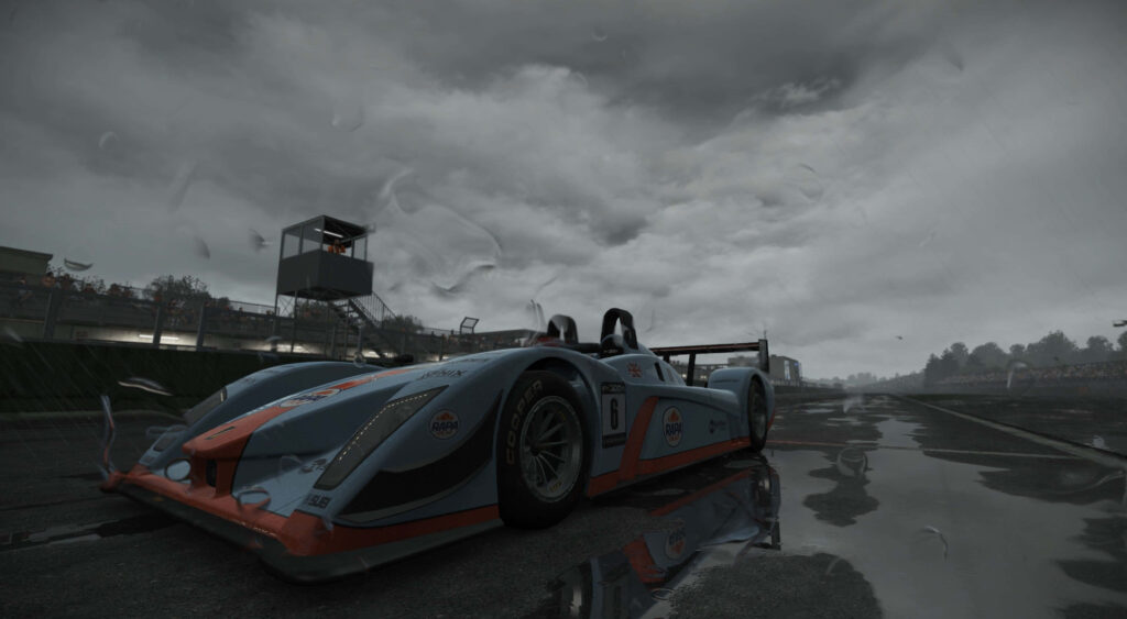 Audi R10 TDI Project Cars 4k wallpaper rain-soaked racetrack moody overcast sky reflection