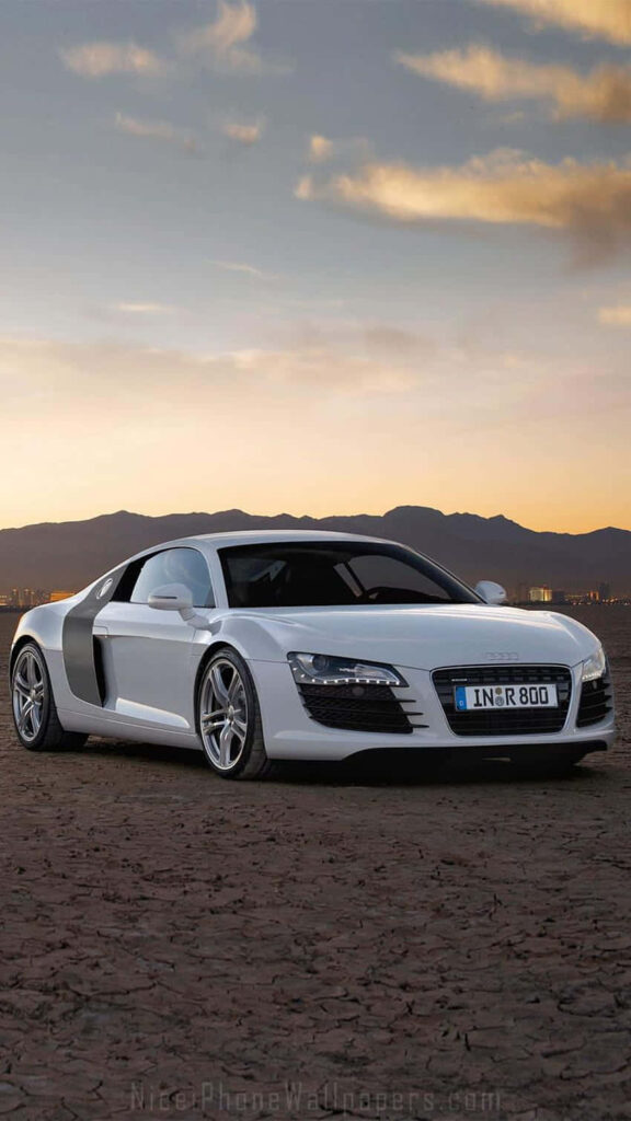 White Audi R8 parked in desert at sunset dramatic sky stylish car enthusiast wallpaper background