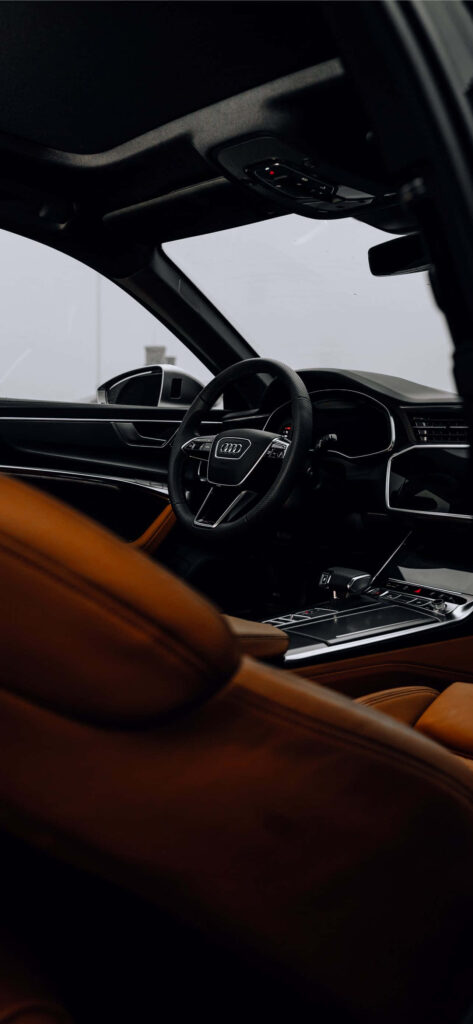 Audi RS6 interior with premium leather seats and advanced digital controls in elegant design Wallpaper