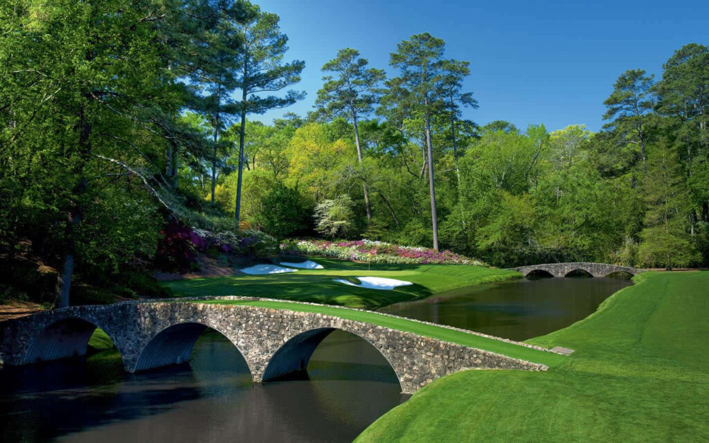 Augusta National Golf Course vibrant azaleas lush fairways iconic stone bridges bright sky wallpaper