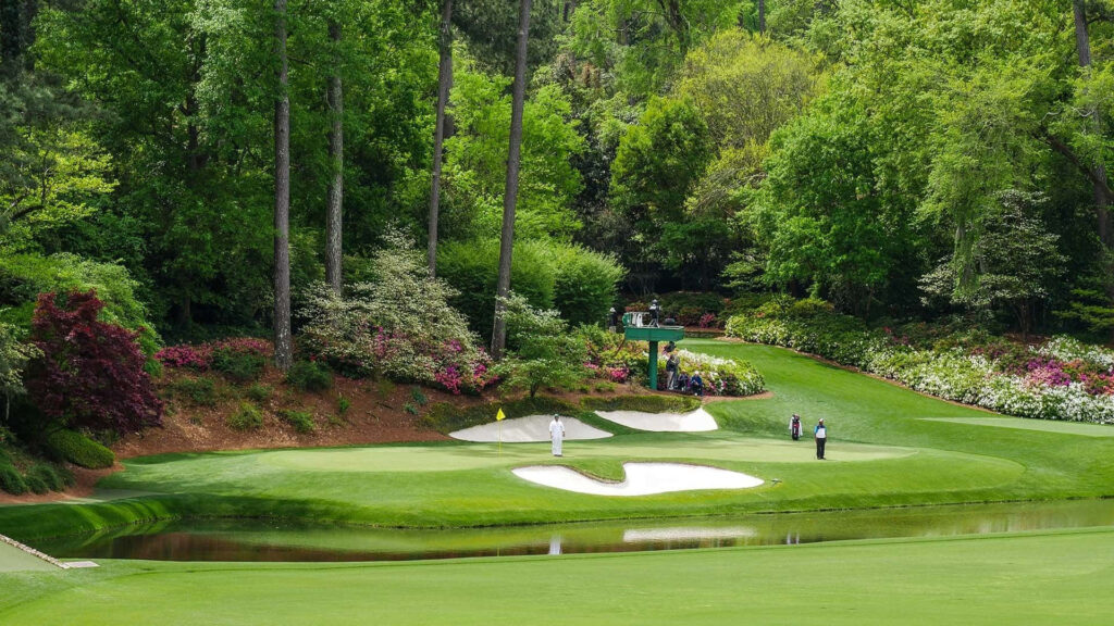 Augusta National Golf Course vibrant greenery flowers and pristine fairways scenic wallpaper background