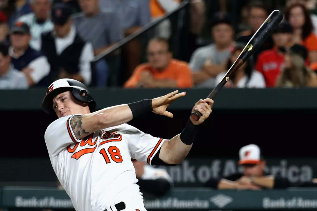 Austin Hays makes an outstanding fielding play showing skill and athleticism dynamic wallpaper