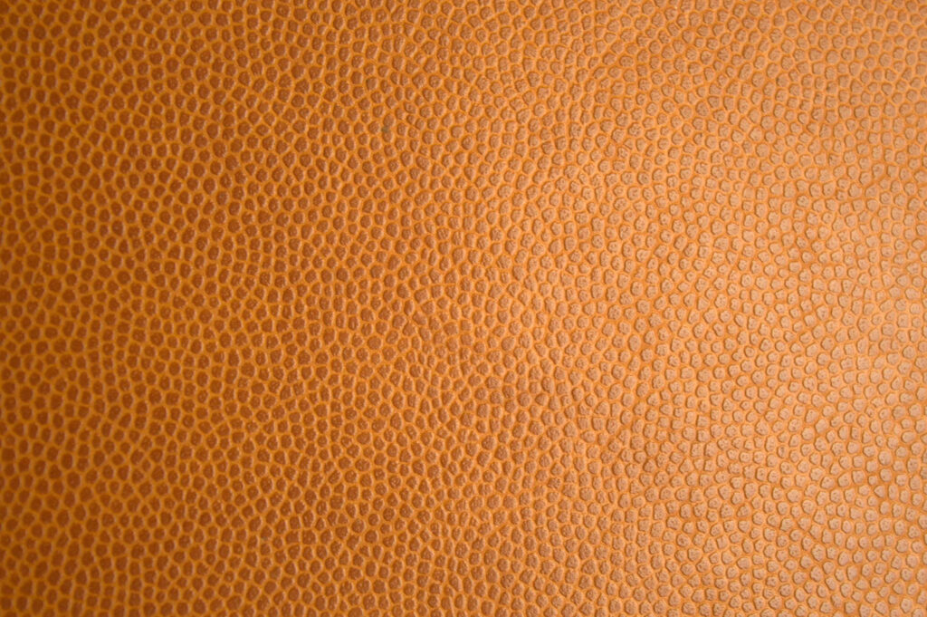 Elegant Light Brown Leather Wallpaper Background with Intricate Grain
