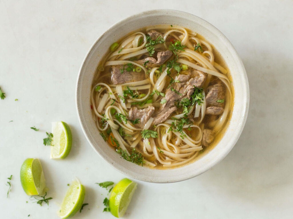 Authentic Vietnamese Pho Wallpaper: Tender Beef, Fresh Herbs, Broth
