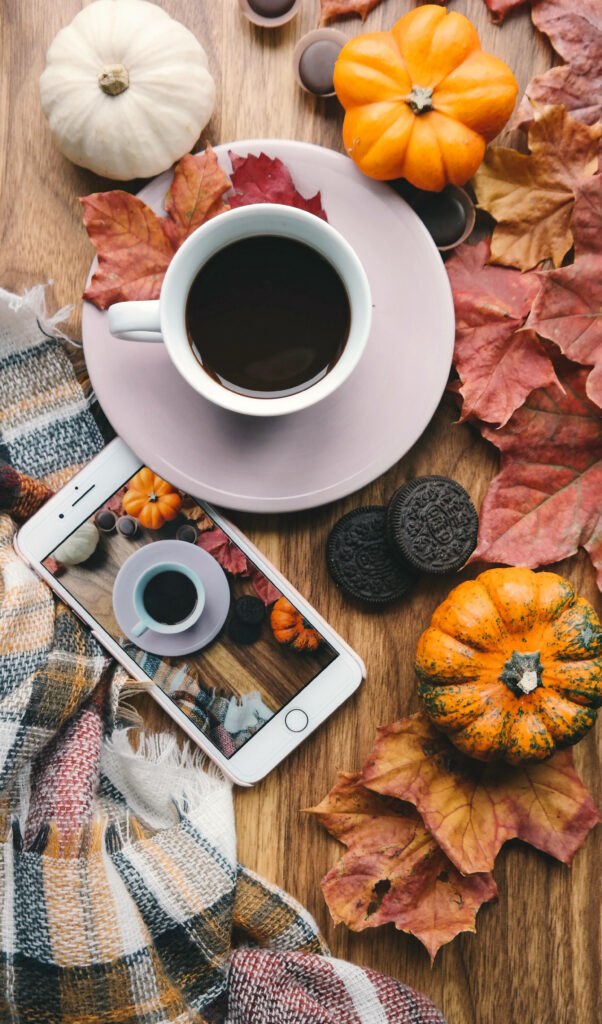 Cozy Fall Wallpaper: Coffee, Autumn Leaves & Warm Vibes